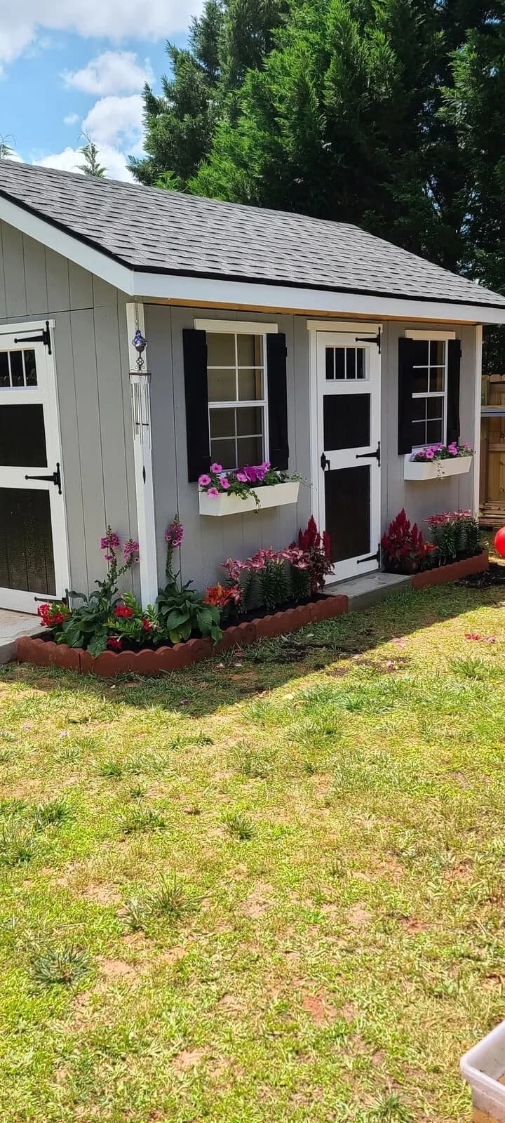 Custom garden shed with flower boxes built in Newnan, GA