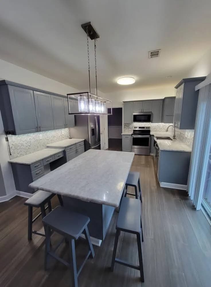 Kitchen remodel with island and pendant lighting in Newnan, GA